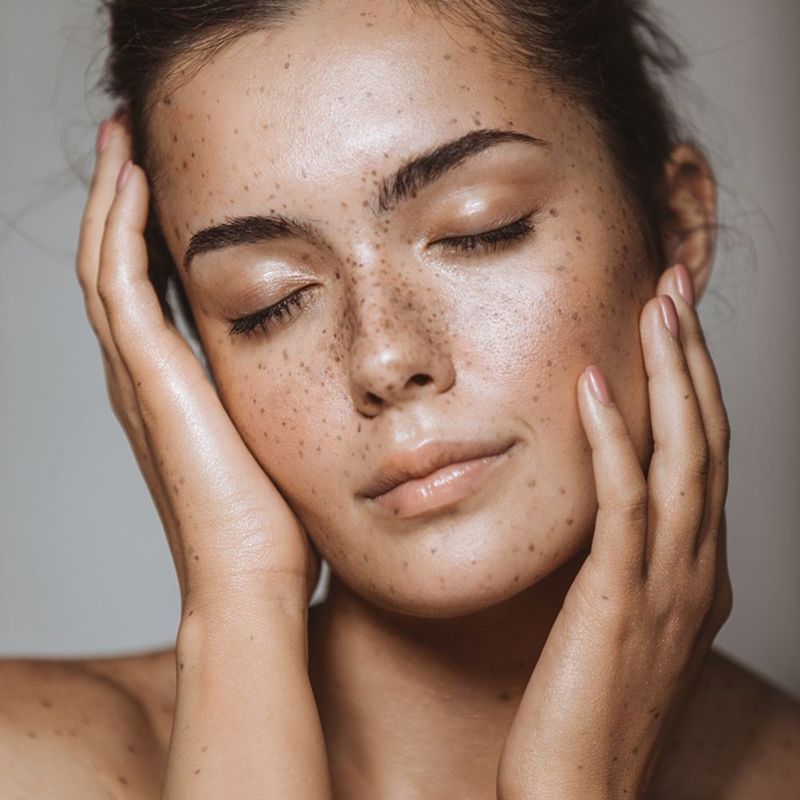 Profile of a woman with smooth skin.