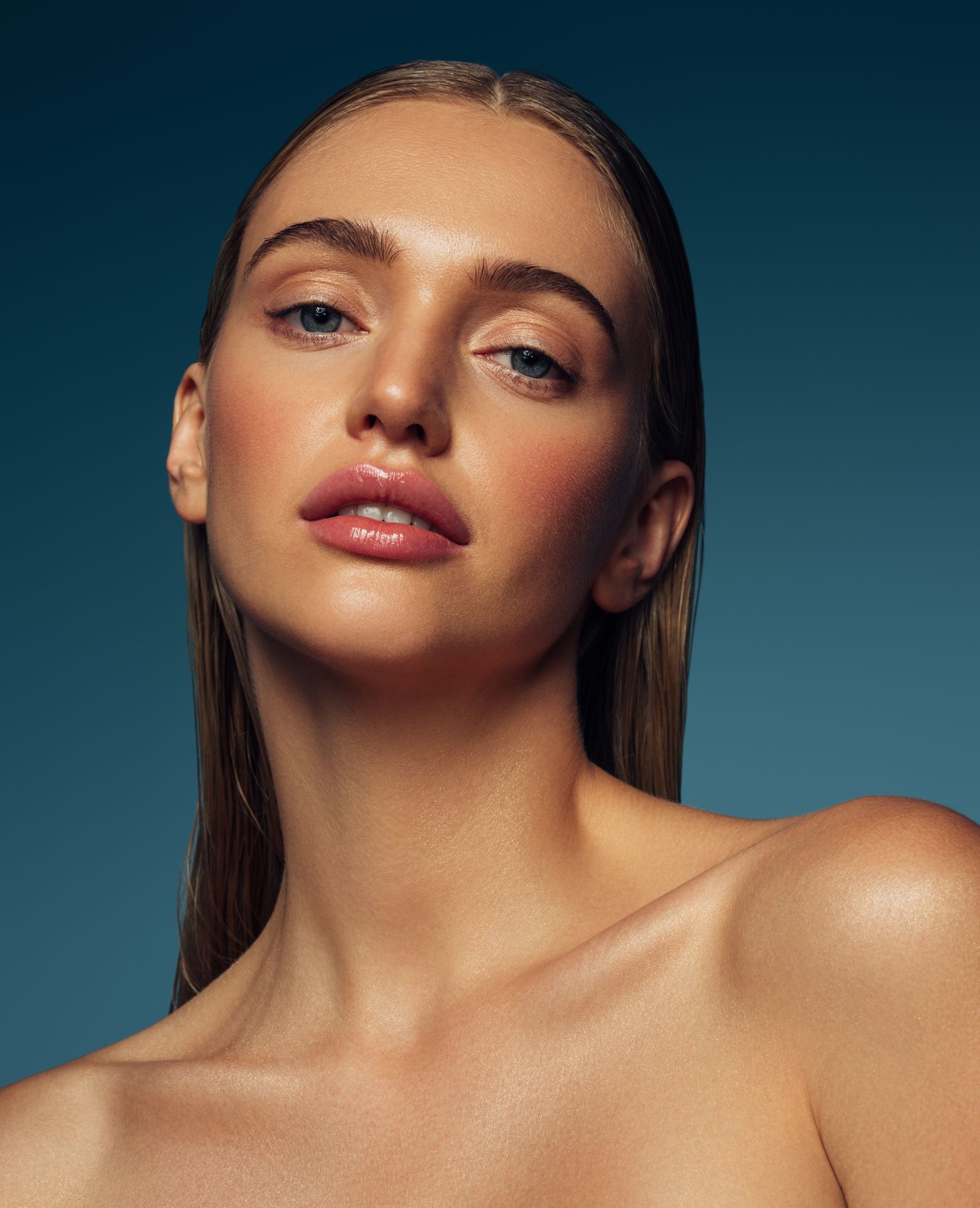 Close-up portrait of a woman with natural makeup.